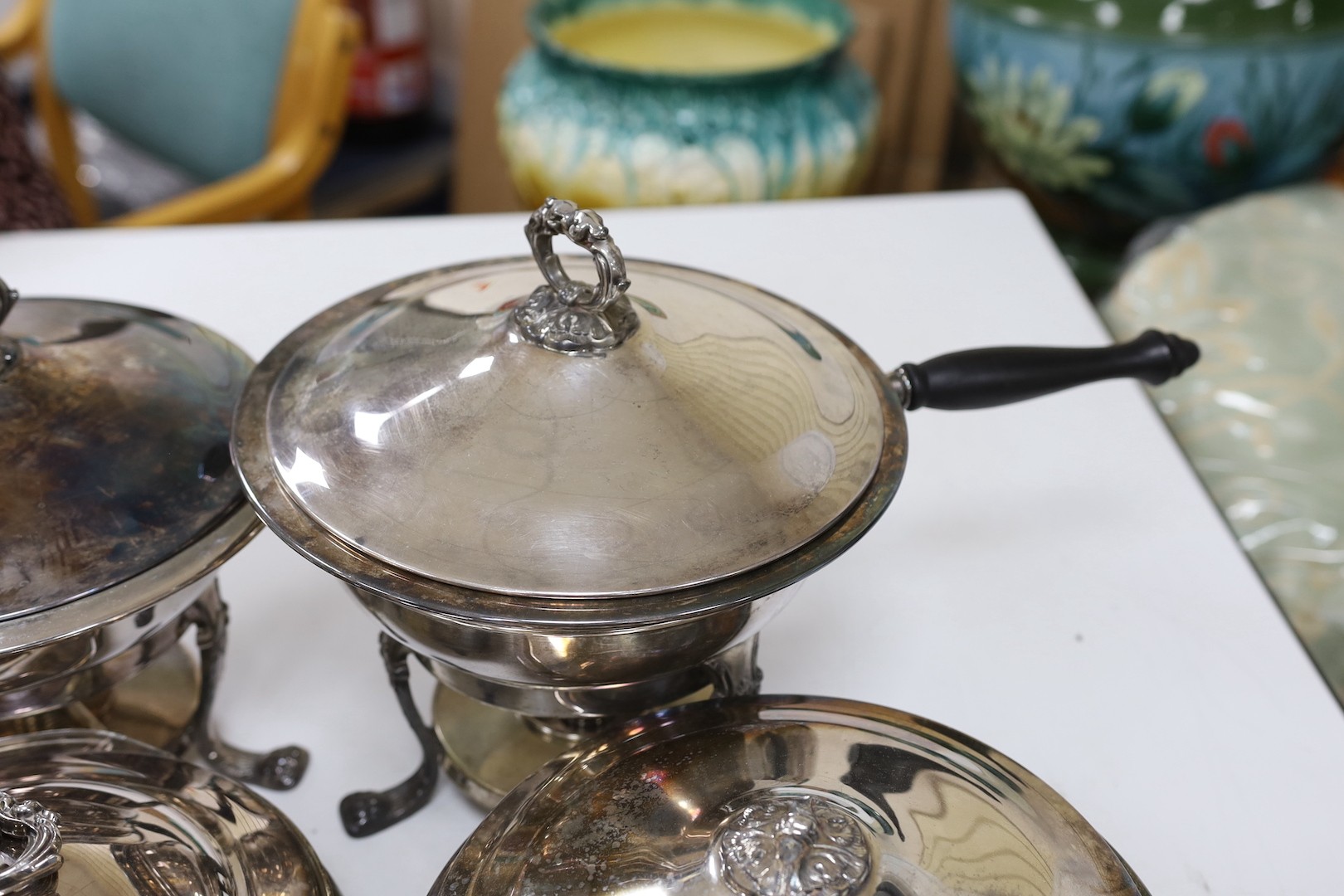 A pair of silver plated bain marie and two matching tureens with covers